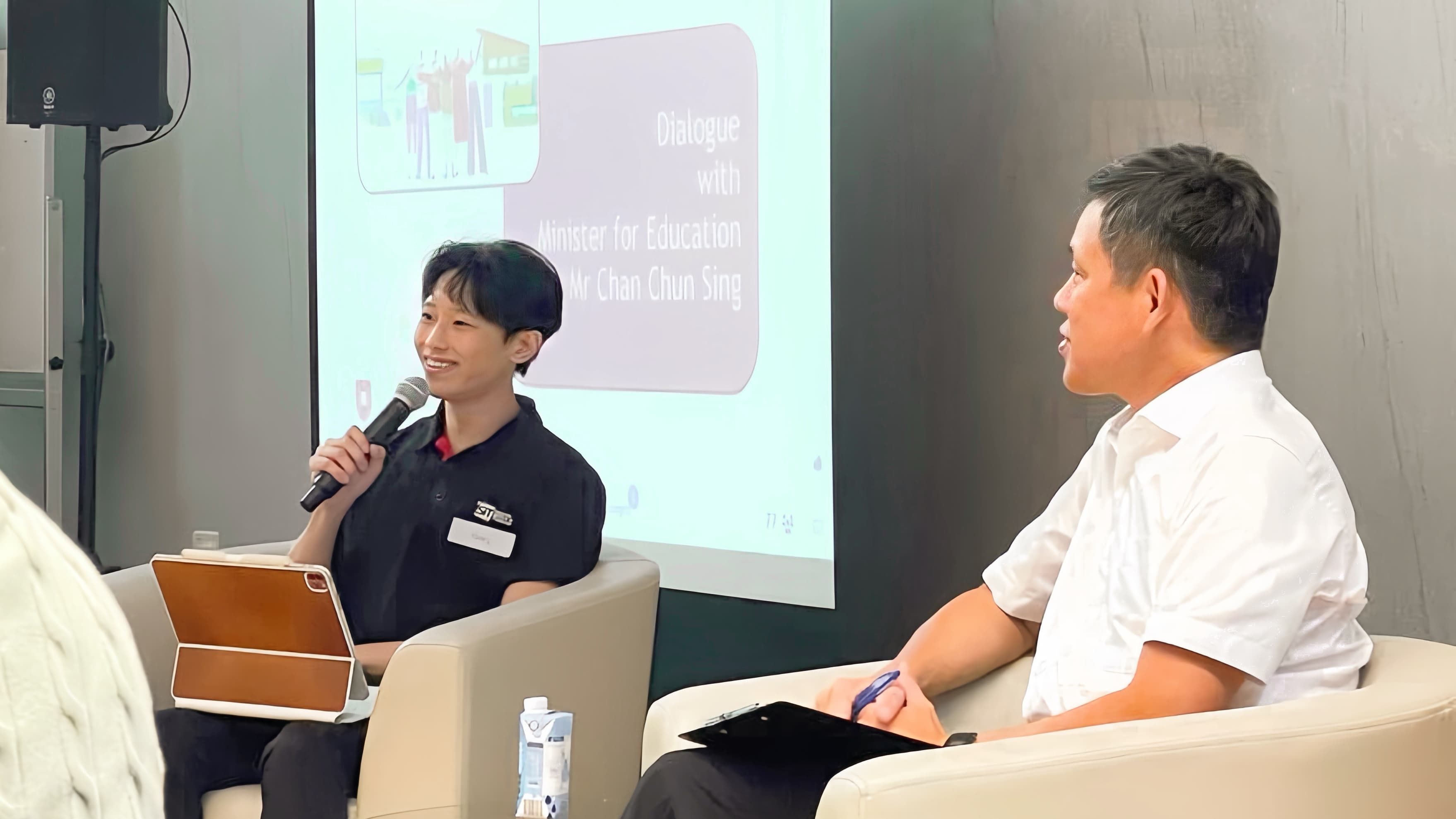 Hans Ong speaking with Singapore's Minister for Education at Singapore Institute of Technology